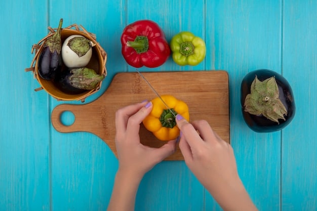A close-up shot of a person's hands chopping vegetables on a wooden cutting board, with various fresh and colorful vegetables scattered around, illustrating healthy and affordable cooking.