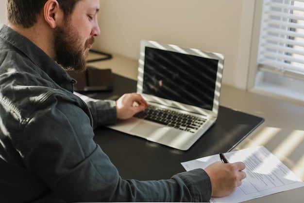 A person reviewing a credit report on a laptop, highlighting the importance of identifying and disputing inaccuracies.