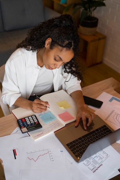 A person working on a budget spreadsheet on a laptop with a calculator and pen nearby. The spreadsheet shows various income and expense categories with formulas and charts illustrating the allocation of funds. The scene evokes a sense of order and financial control.
