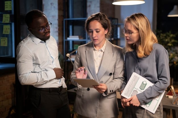 A diverse group of young professionals collaborating on financial planning, reviewing charts and discussing investment strategies in a modern office setting.