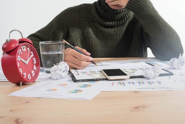 A person working on a budget and repayment plan, surrounded by financial documents, symbolizing the organized approach of Chapter 13 bankruptcy.