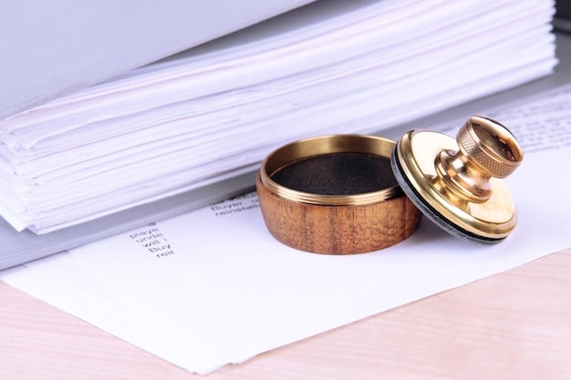 A gavel resting on top of a stack of financial documents representing legal decisions about debt in divorce cases.