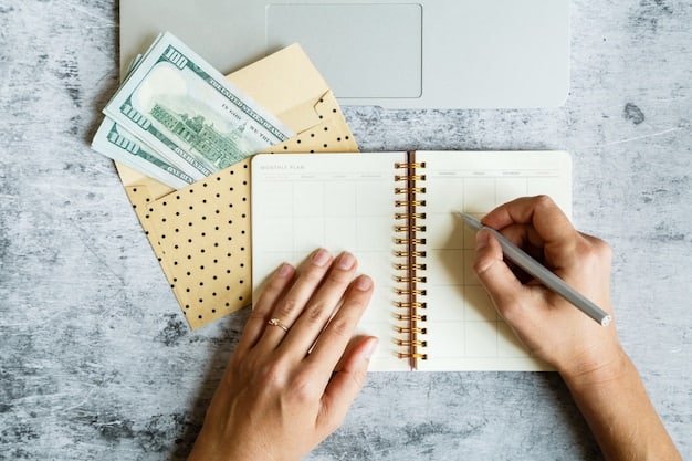 A close-up shot of a person writing down their expenses in a notebook. The notebook is open on a table with various bills and receipts scattered around. The focus is on the pen and the handwritten entries in the notebook.