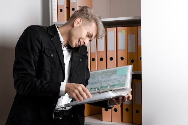 A person reviewing documents with a look of determination, symbolizing the persistence required in the debt validation process.