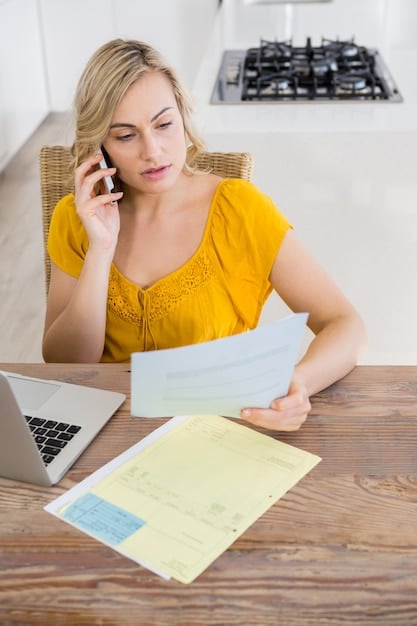 A person organizing documents and receipts related to home improvements, with a calculator and tax form visible in the background. The image emphasizes careful record-keeping for tax purposes.